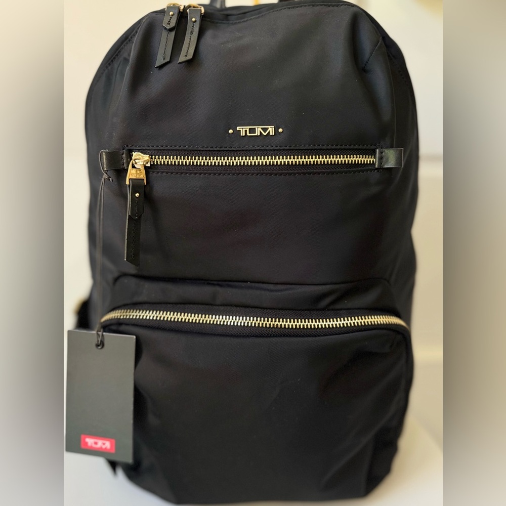 TUMI Carly  Black Backpack with Gold Accents